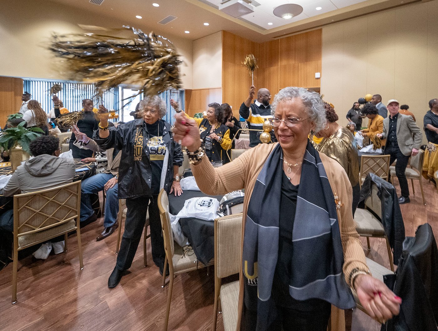 ASU Alumni celebrating in a hall